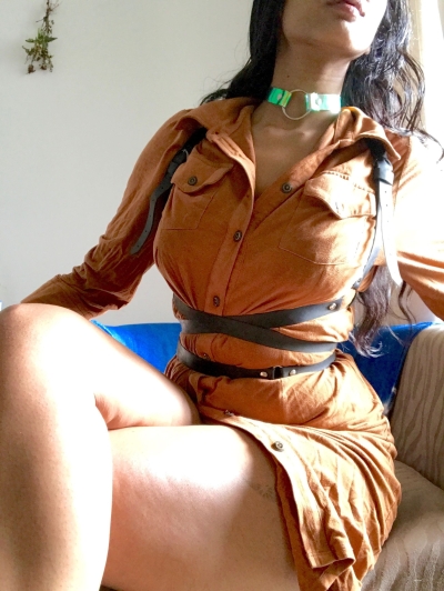 Dark-skinned woman posing naked