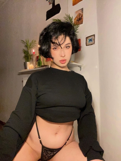 Sexy brunette shows her pussy and her tits
