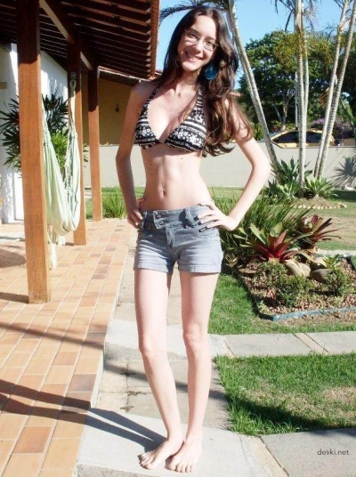 Slender girl with glasses
