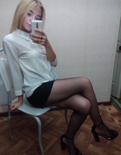 Cutie in stockings takes off her panties
